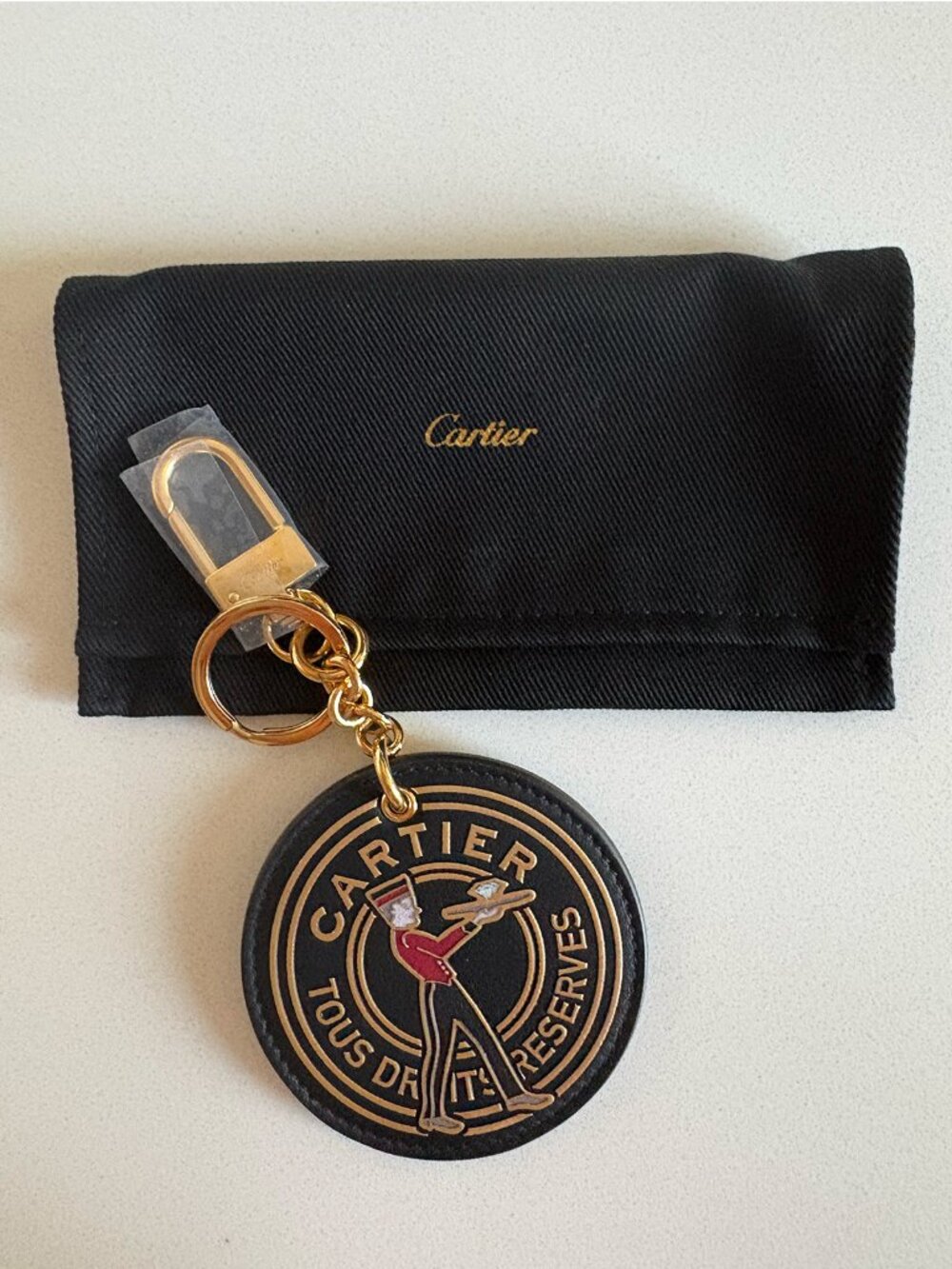 Cartier "Tous Droits Réservés" Panthère Leather Keychain & Bag Charm — Full Set